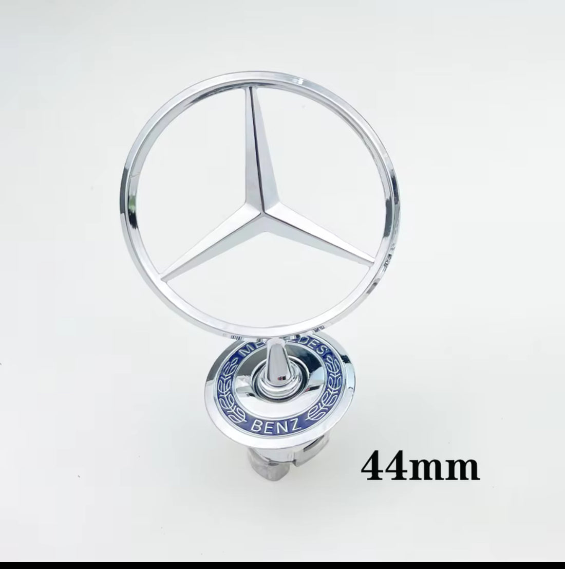 Mercedes blå-sølv emblem med logo