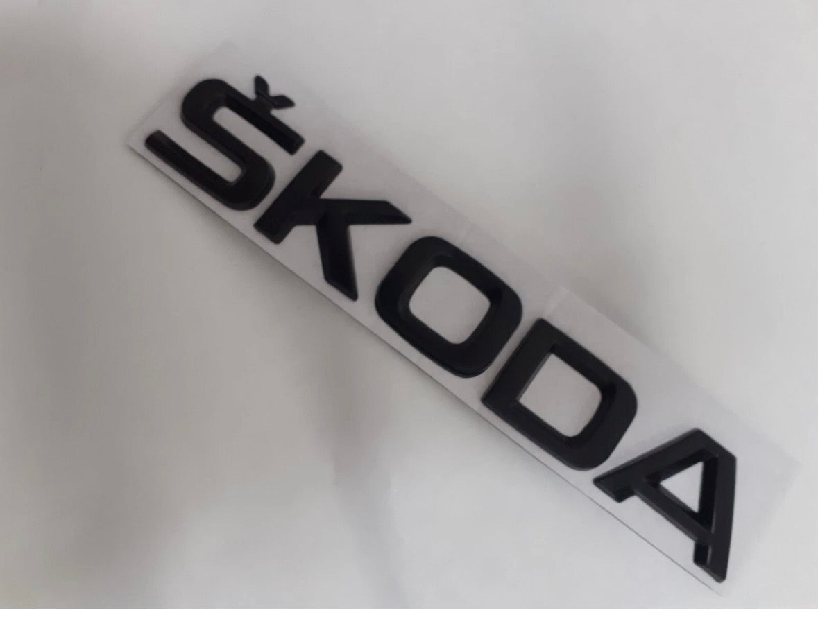 Skoda sort emblem 14.5 cm x 2.5 cm