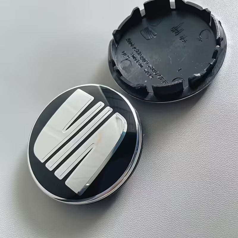 Seat sort-sølv centerkapsler 4 stk